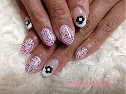 ツイードとカメリアを合わせた大人カジュアルネイル